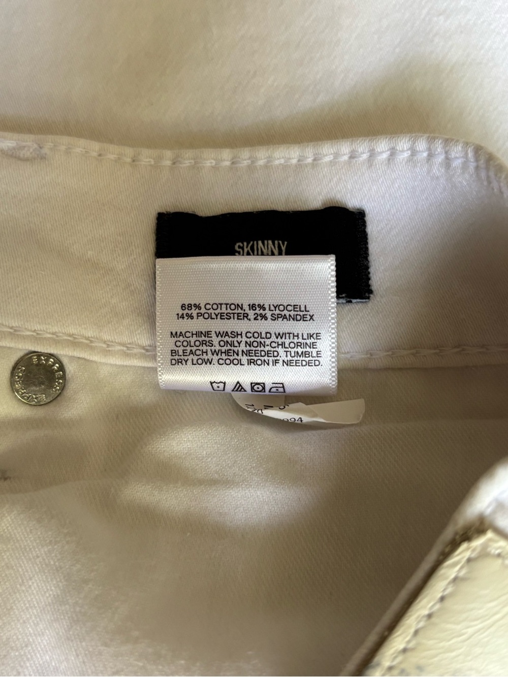 Express Skinny Mid Rise Cotton Stretch Jeans - Picture 7 of 9